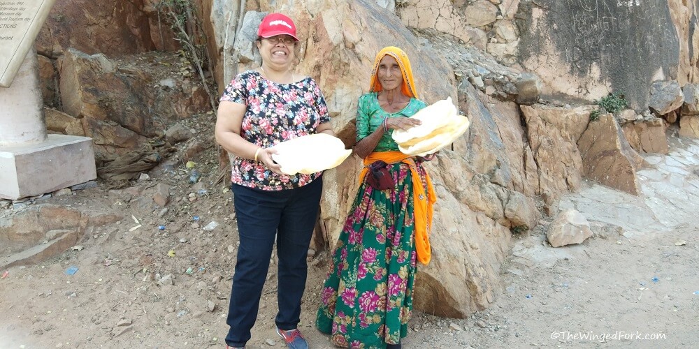 Mom and the papad seller lady just outside the fort - TheWingedFork