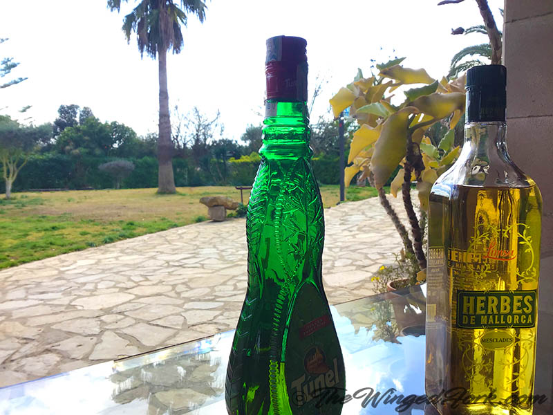 Different bottles of Majorcan Herbes drink.