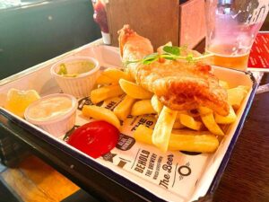 Fish and chips with sauces.