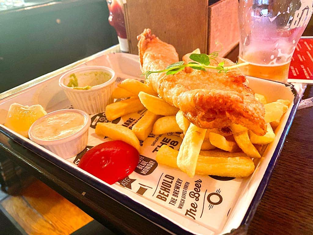 Fish and chips with sauces.