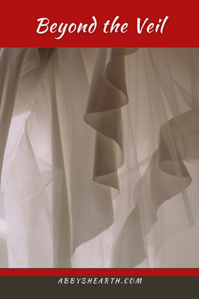 White curtains like a veil and text "beyond the veil".