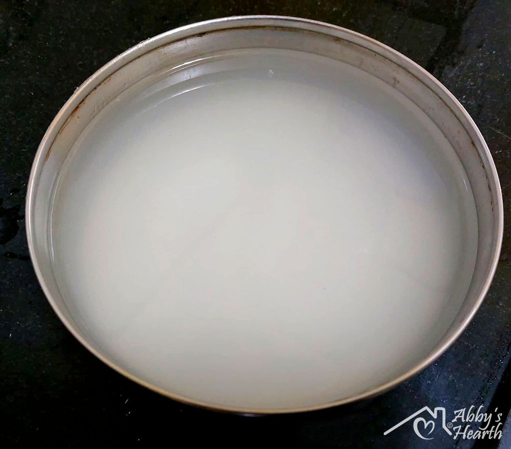 Rice kanji (rice water) in a steel bowl.