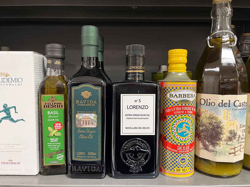 Varieties of olive oils on the shelf.