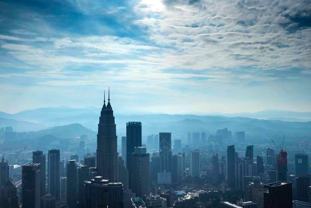 View of the top of the Petronas Towers in Malaysia.