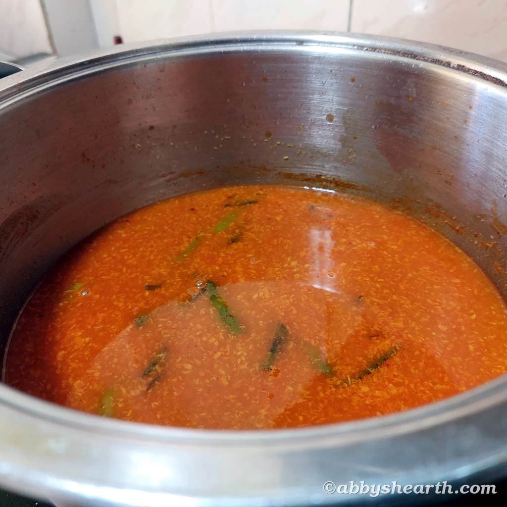 The lonvas curry cooks for a little while.