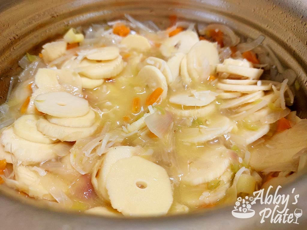 Bamboo cooking in a pot.