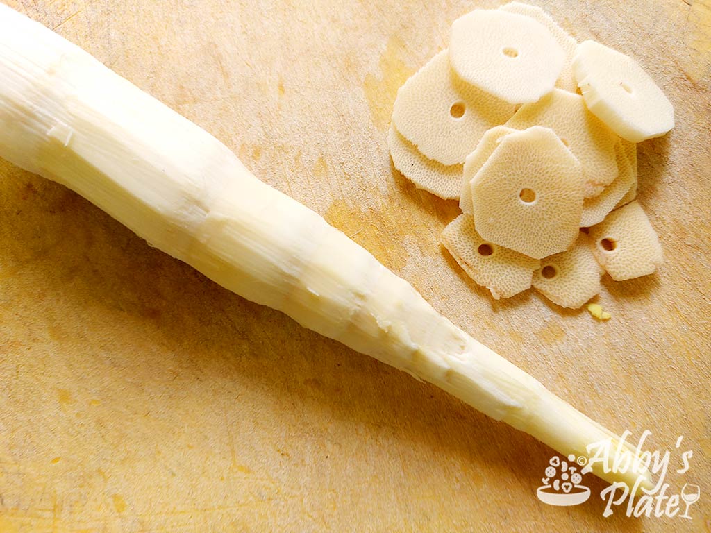 Skinned bamboo being sliced.