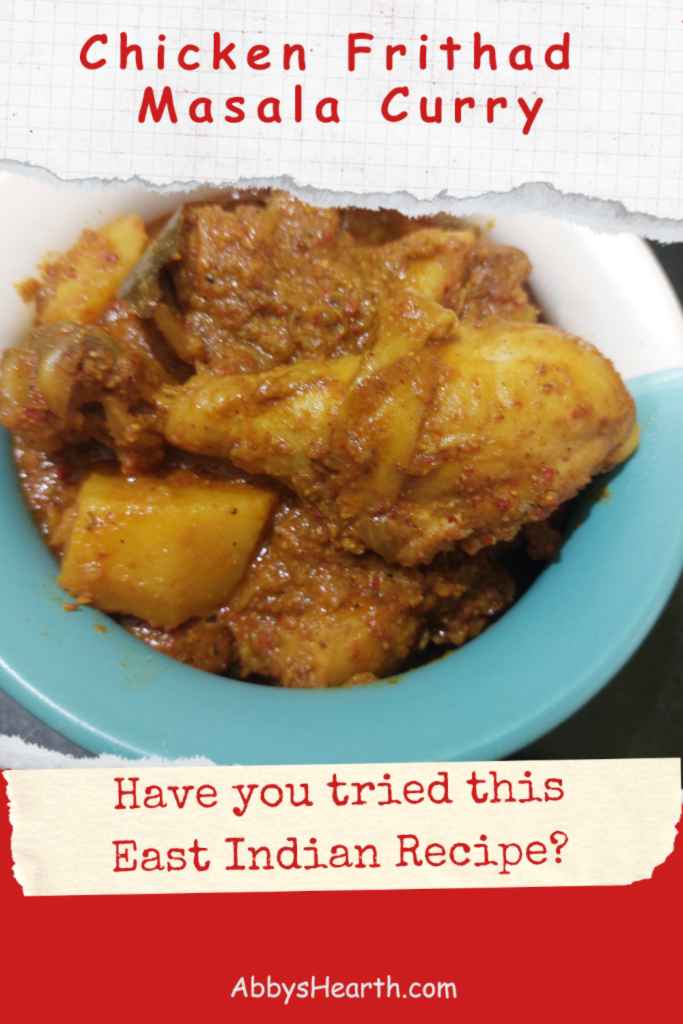 Chicken frithad masala curry in a blue and white pot.