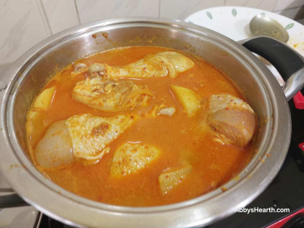 curry cooking with water.