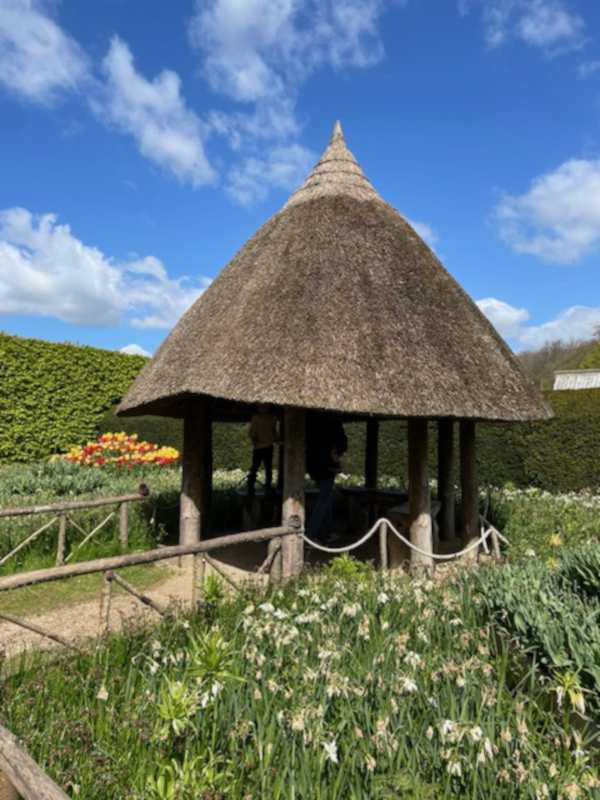A thatched gazebo.