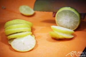 Lemons being sliced.