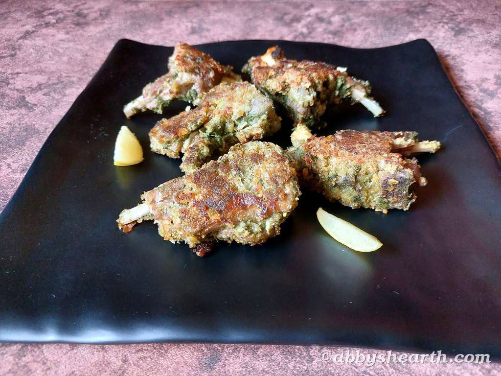 Smaller sized fried green chutney mutton chops.