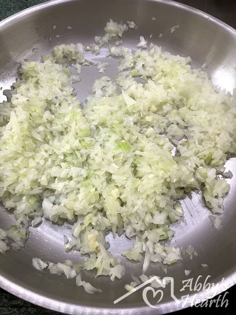 Mince the onions and fry in a pan.