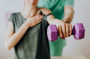 Patient getting shoulder exercise.