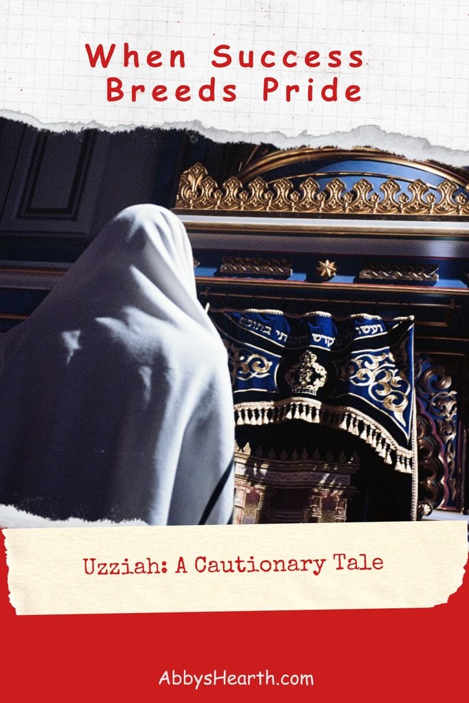 Person in white tallit near ornate Torah ark.