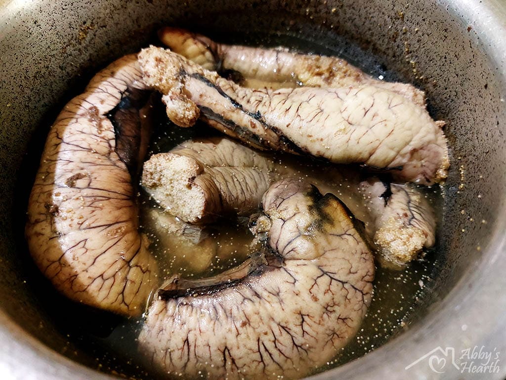 Boiled fish roe in a pot.