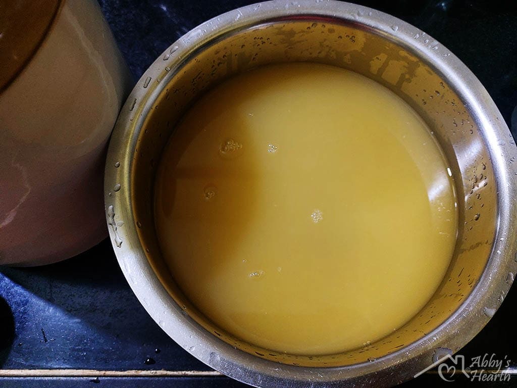Strained Mango wine in a vessel.