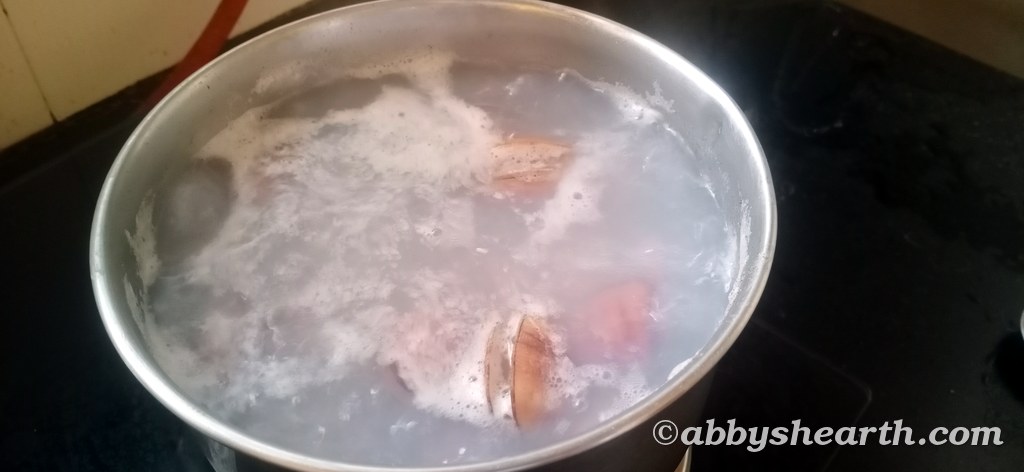 Cockles or thisra boiling in water.