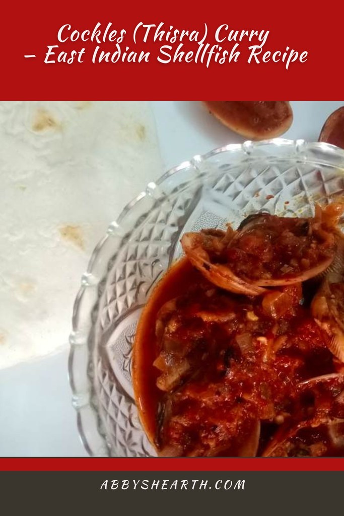 Cockles curry in a glass bowl.