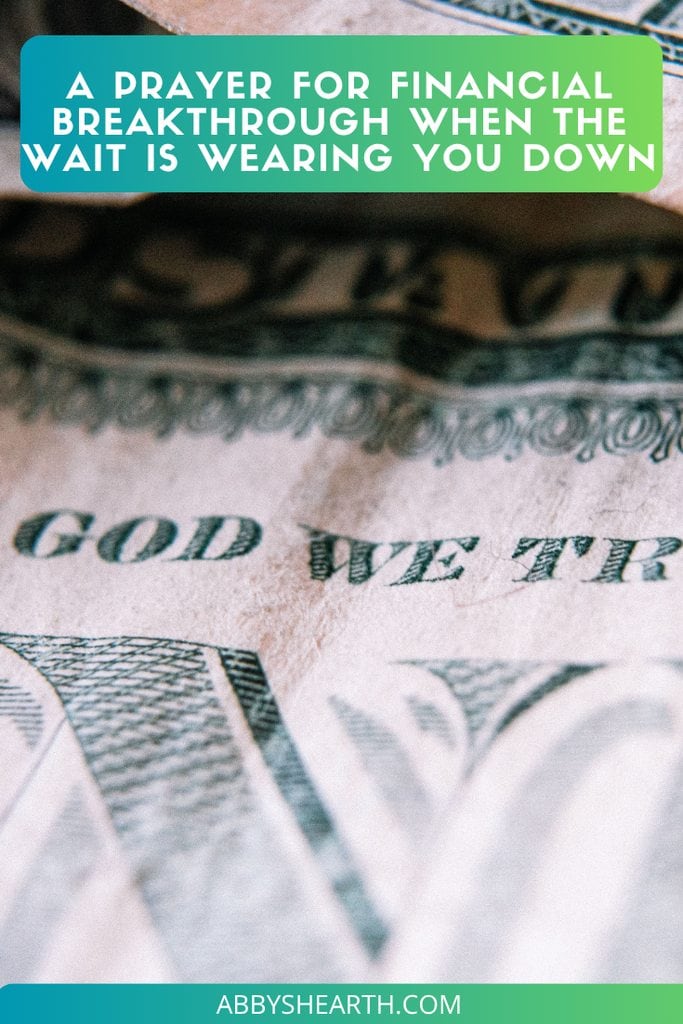 Close up image of the 'In God we trust' section of a dollar bill.