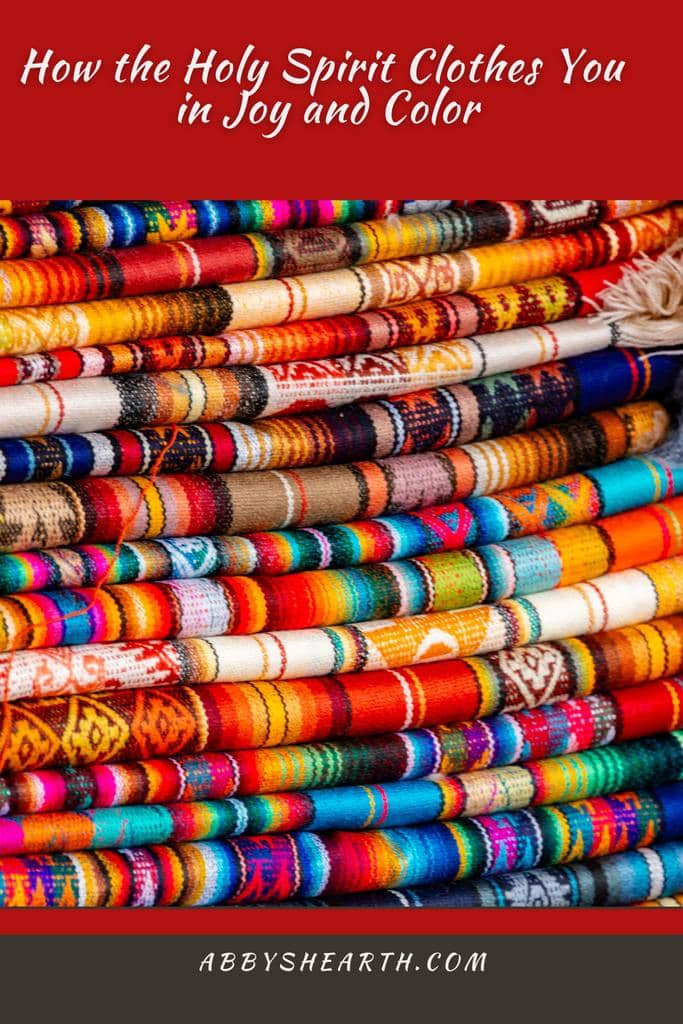 Stack of vibrant cloth materials with diff weaves.