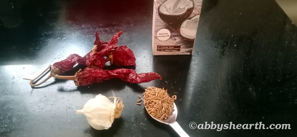 Red chilies, garlic, cumin and coconut milk.
