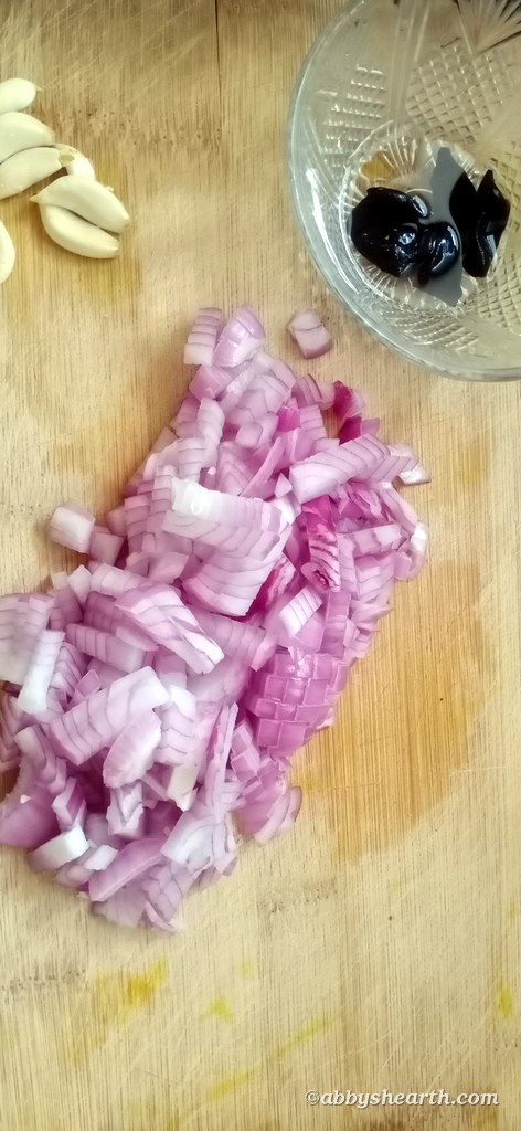 Soak the kokum in water and dice the onions.