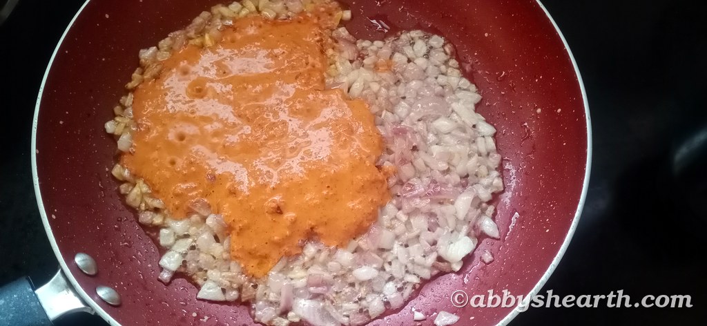 Add the ground masala to the frying onion.