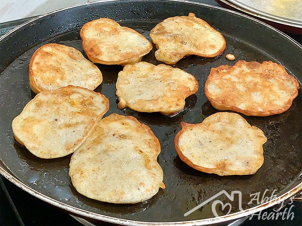 Turn the fritters over and allow to fry on the other side.