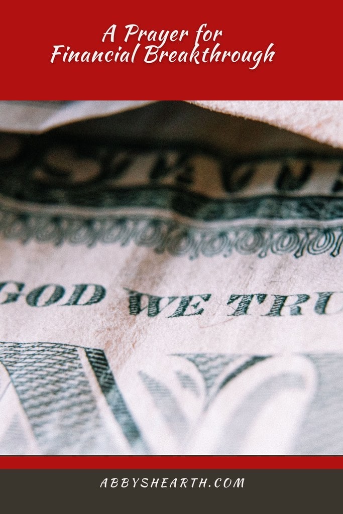 Zoomed in 'In God we trust' section of a dollar bill.