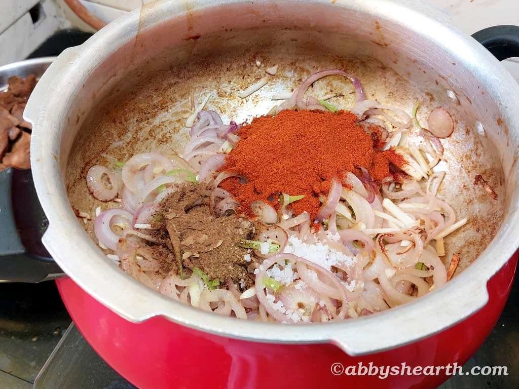 Bottle masala, garam masala and salt added to the onions.