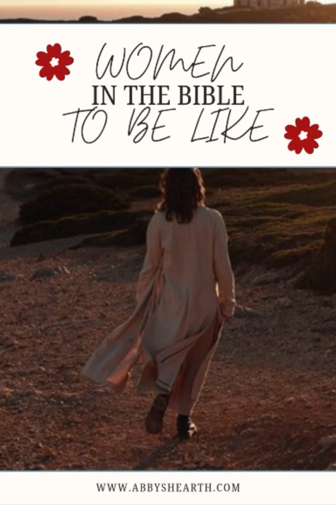 Woman walking towards the sunset on a cliff.