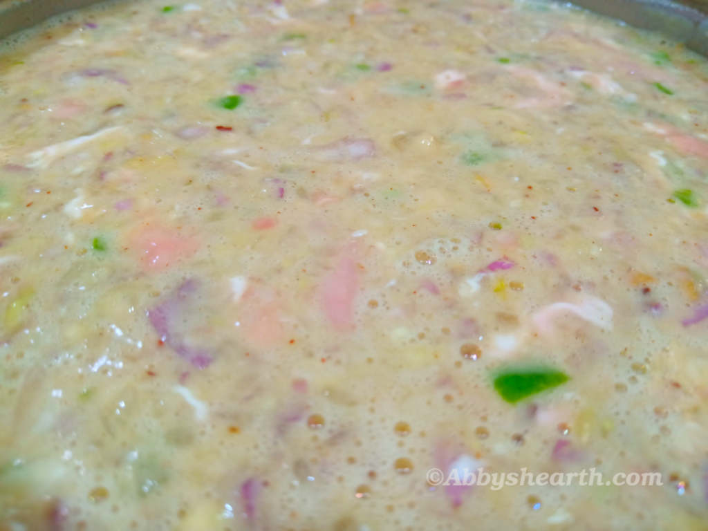Brain cutlet batter in a steel pot.