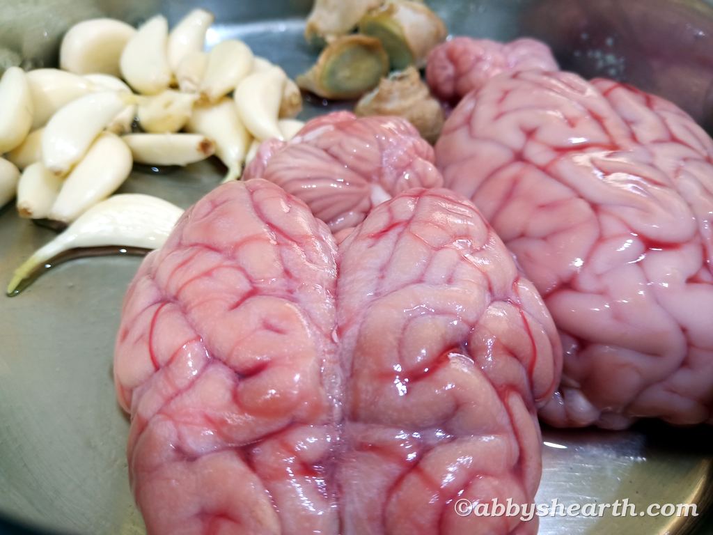 Goat brains, garlic and ginger.