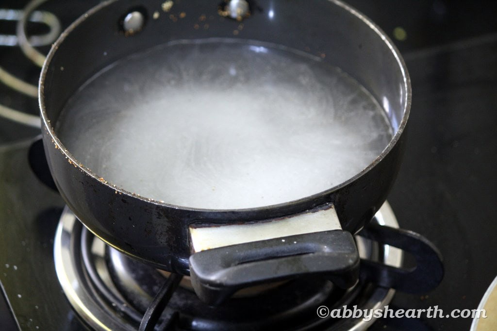 Add sugar to water and allow to boil.