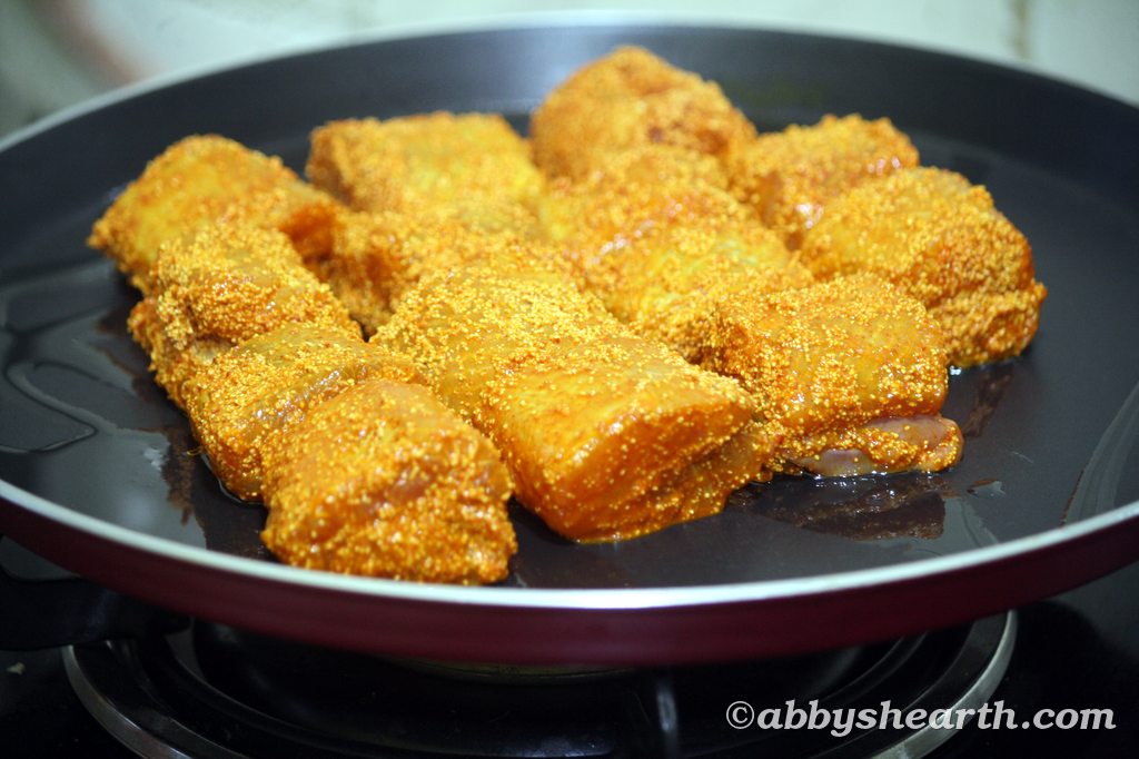 Milk shark fish frying on a pan.