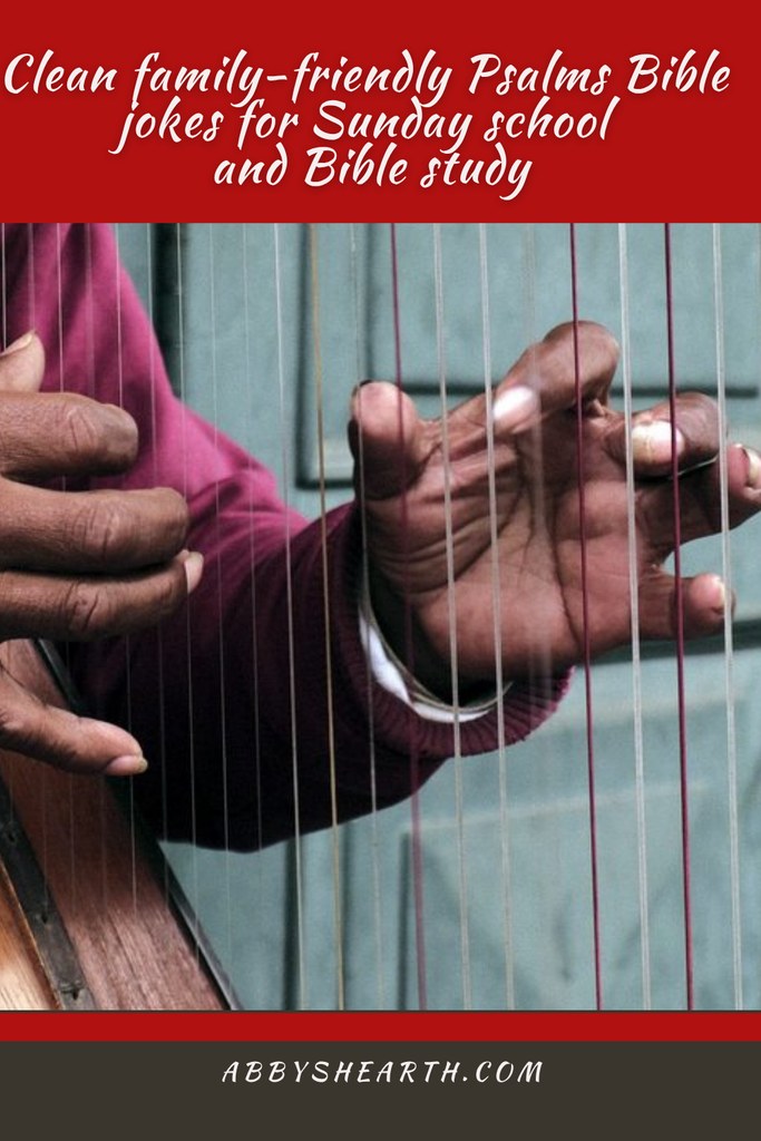 Close-up of hands playing a harp, emphasizing the instrument's use in worship.