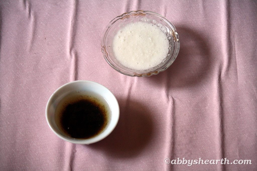 One bowl of tamarind pulp in water, one bowl of desiccated coconut in water.