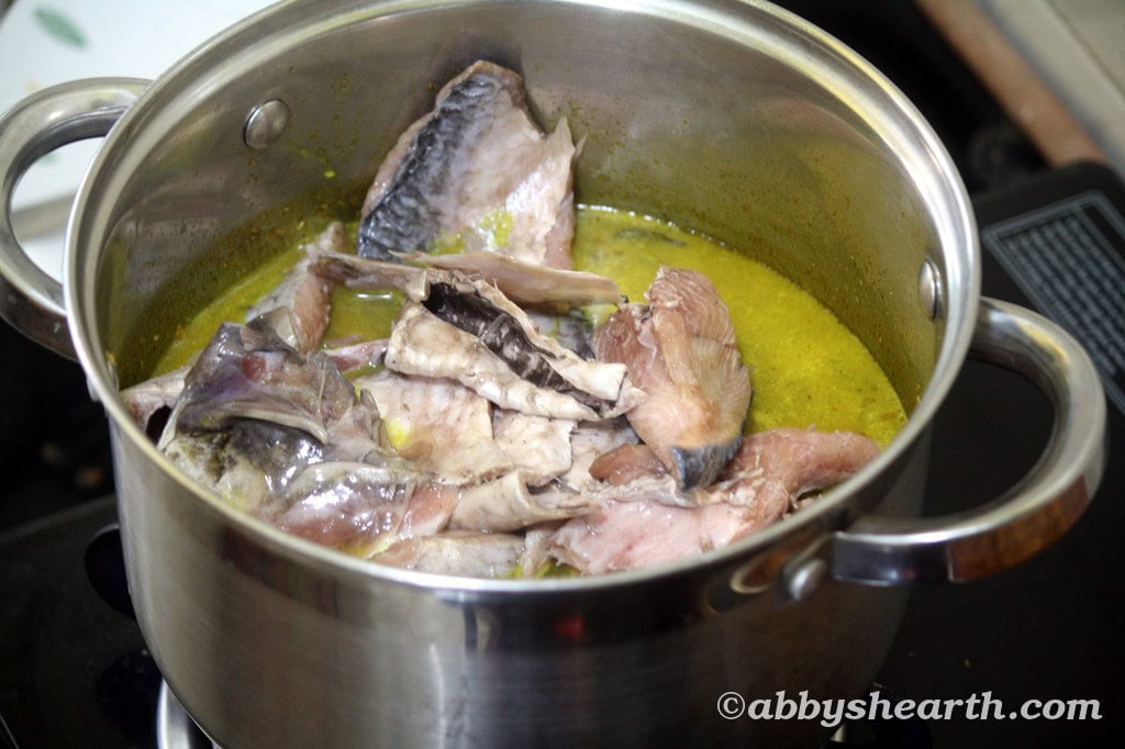 Illish fish pieces added to the khujit curry pot.
