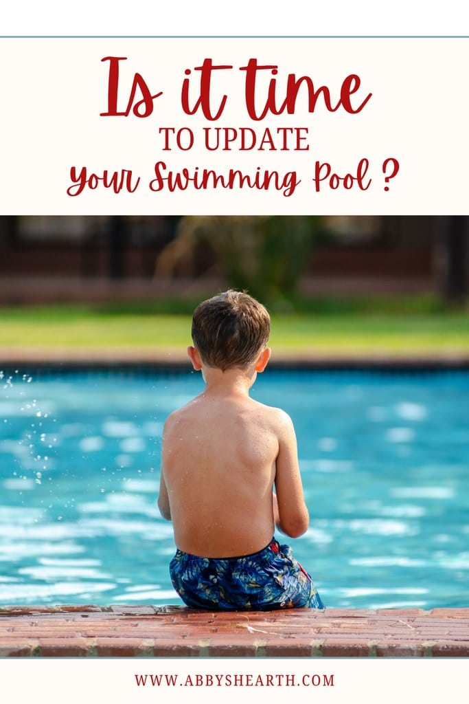 Child sitting on the edge of pool.