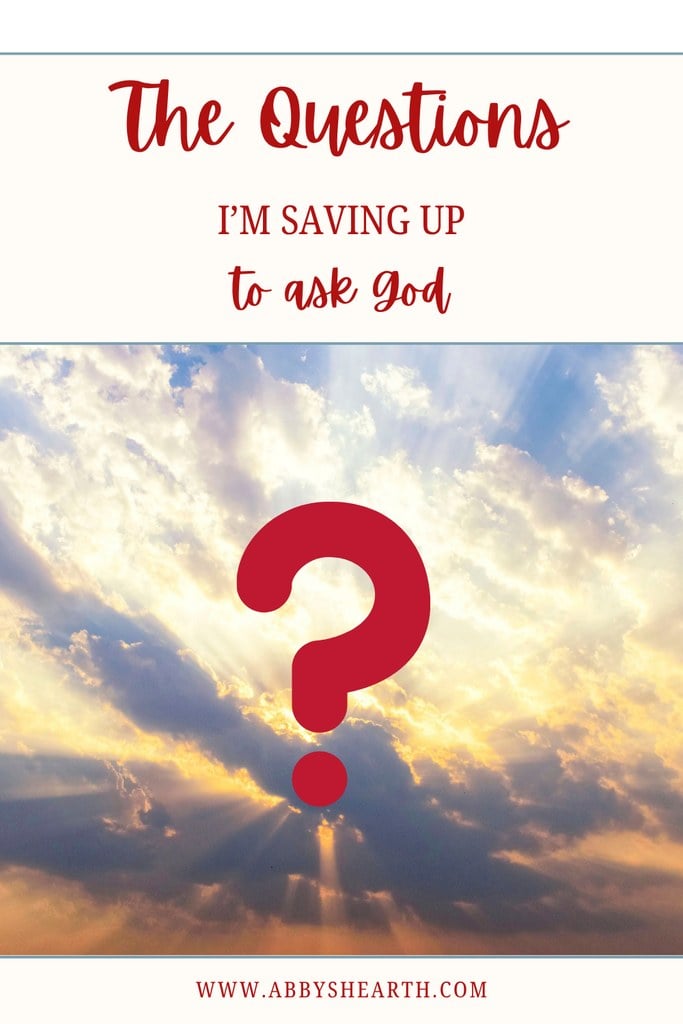 Sky with clouds and sun rays and a large red question mark in the center.