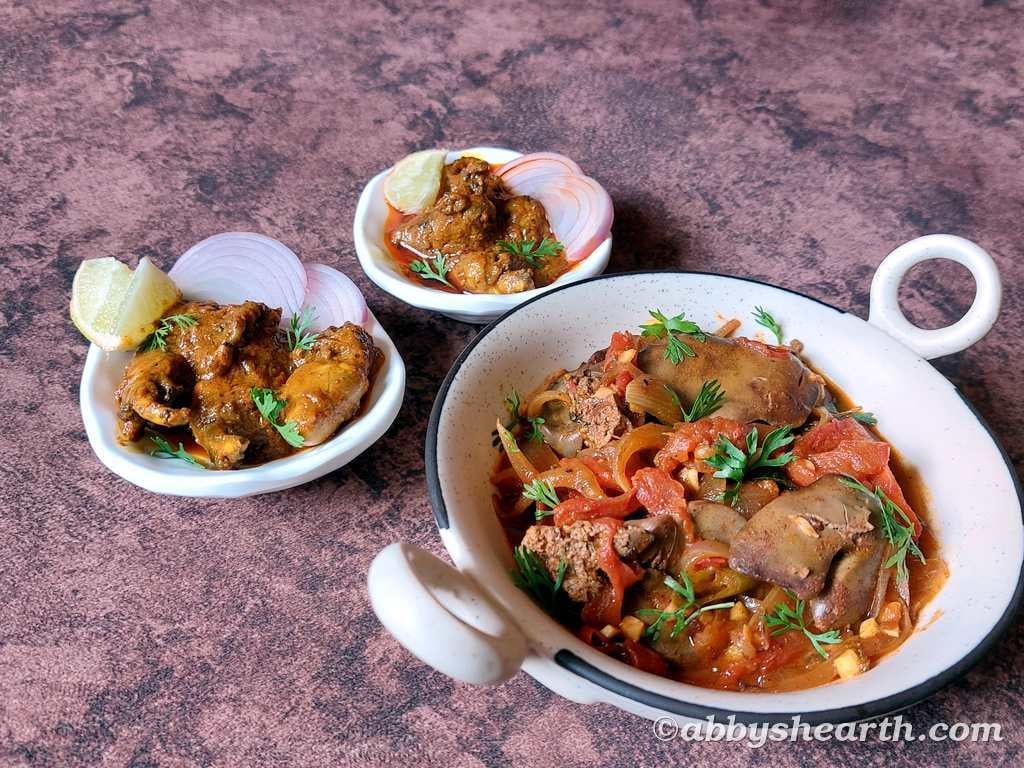 Chicken liver stir fry with vegetables in a white serving dish.