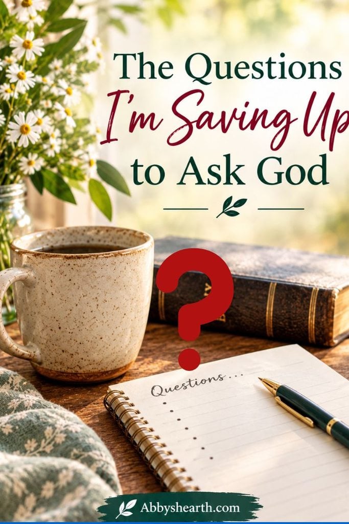 Book, coffee mug, and notebook with questions for God on a wooden table.
