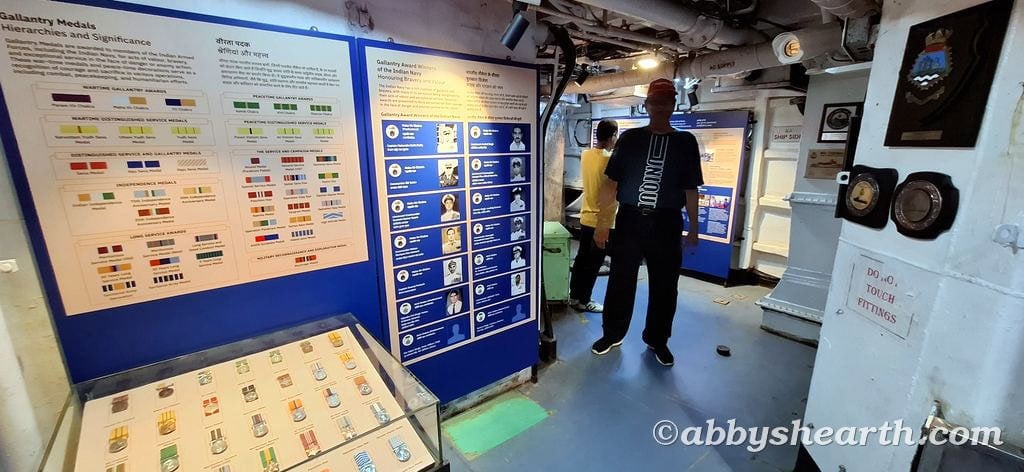 Dad viewing the medals and displays in the medals room.