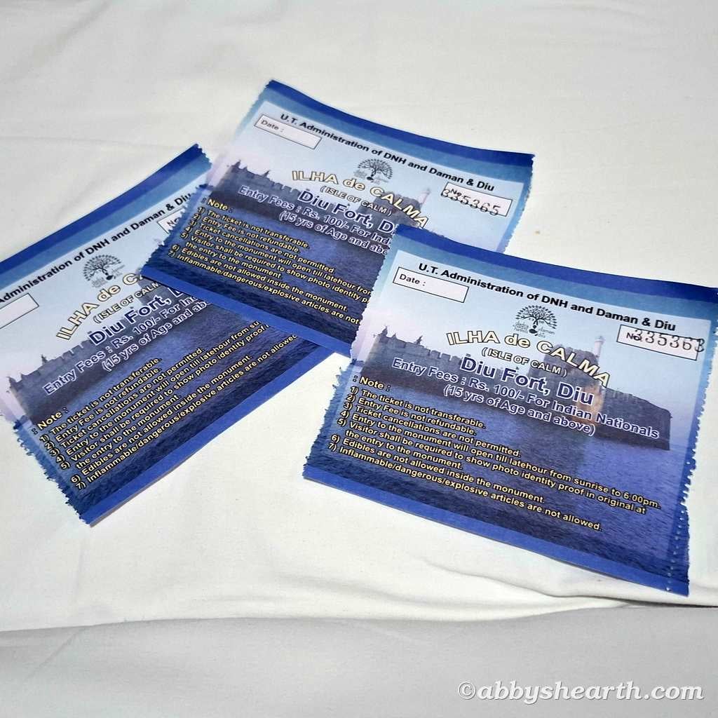Tickets for Diu Fort sightseeing in Diu, India, on a white surface.