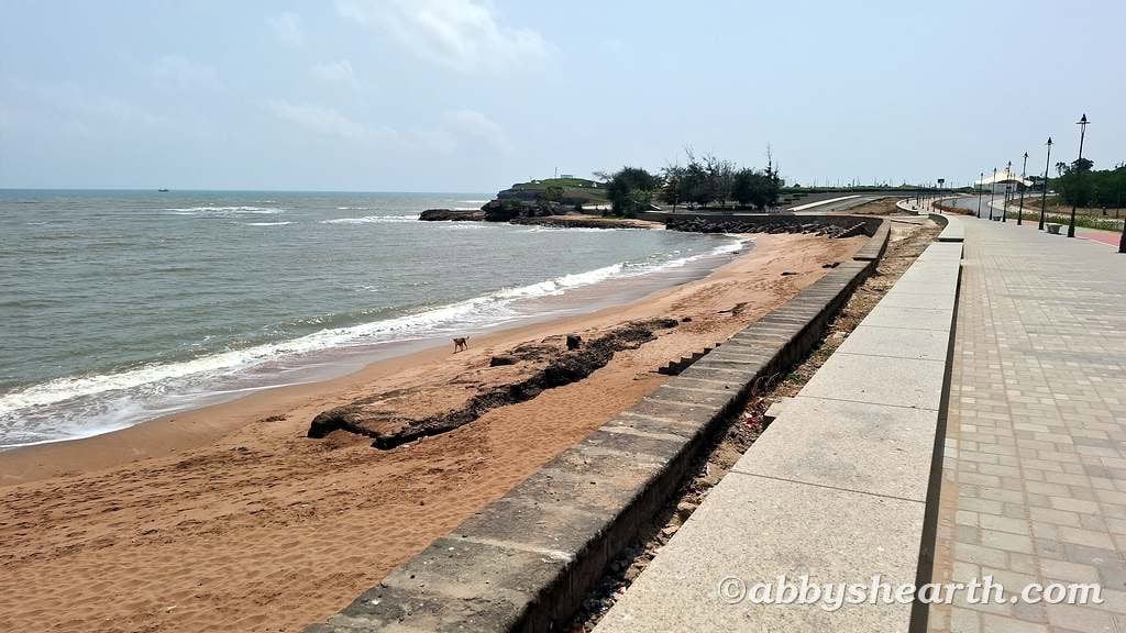 Scenic view of Jalander beach with promenade and sea waves.