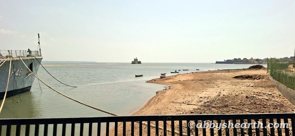 Diu with naval ship on left and Diu fort on the right.