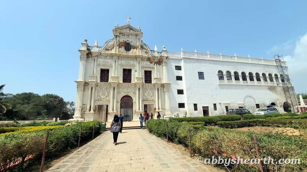 Parents nearing the door of St. Paul's Church in Diu.